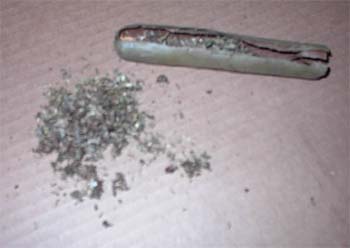 Stuffing a blunt with marijuana in a granularized form for greater surface area.