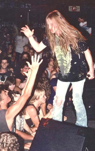 bruce corbitt performing live with rigor mortis as vocalist and crowd instigator